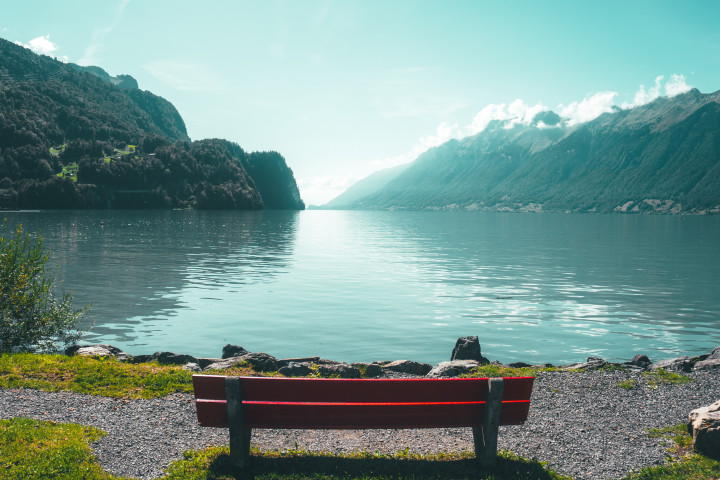 Bench by a mountain lake